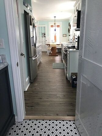 Bathroom is off the kitchen. 
