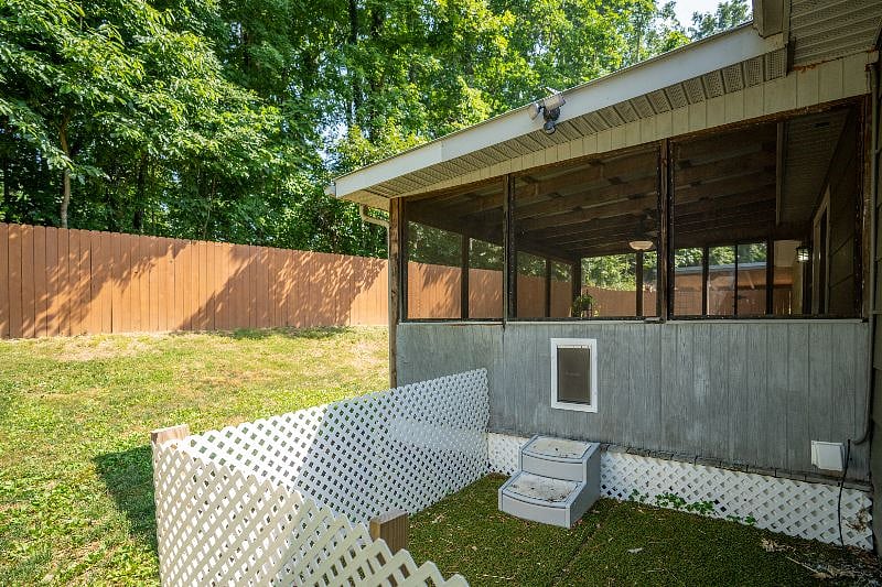 Fully fenced back yard, doggie door and additional fenced in area for your fur baby.