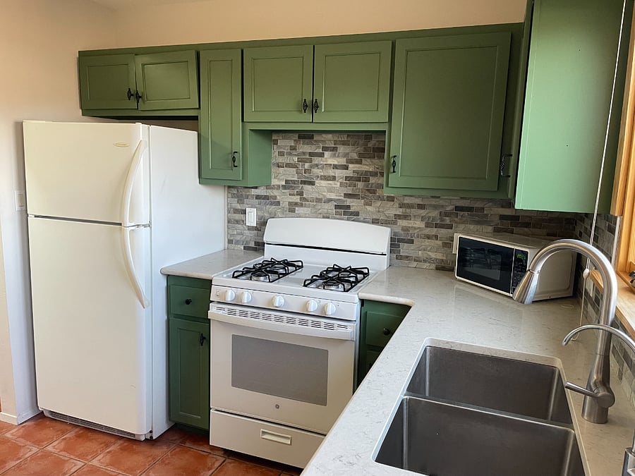 Kitchen leads to backyard