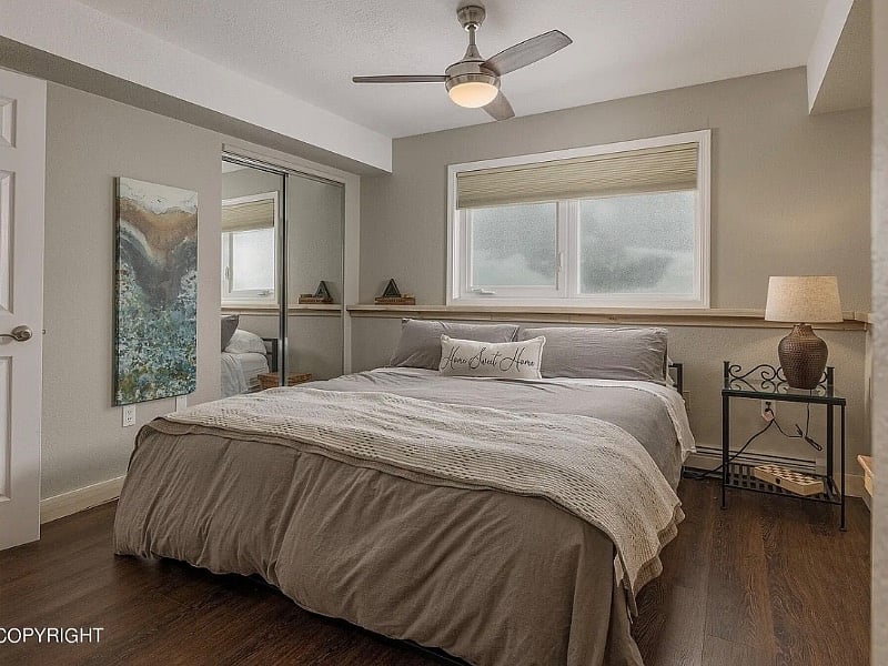 Extremely comfortable king size bed and bedding! And another closet in the bedroom.