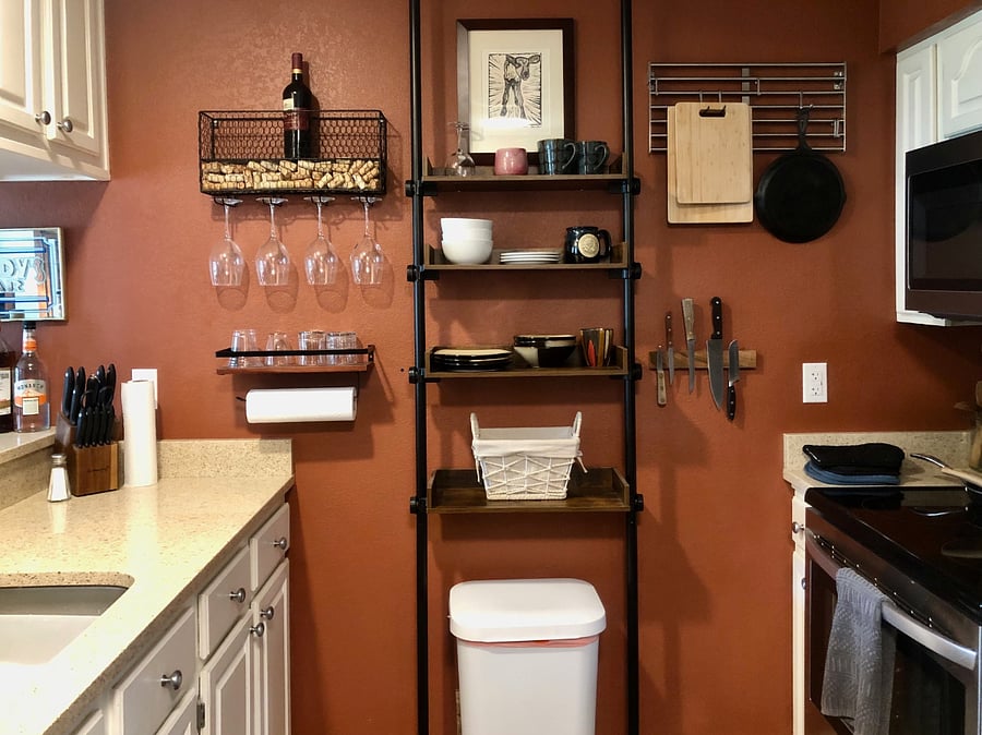 Kitchen range is all electric. There is a dumpster in the parking lot for your trash.