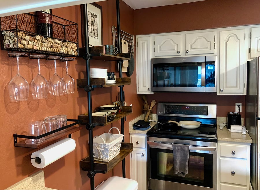 Kitchen is small but comes with flatware, dishes, glasses, mugs, bake & cookware, an Instant pot, Ninja food processor set, assorted ceramic and metal fry pans and cooking utensils.