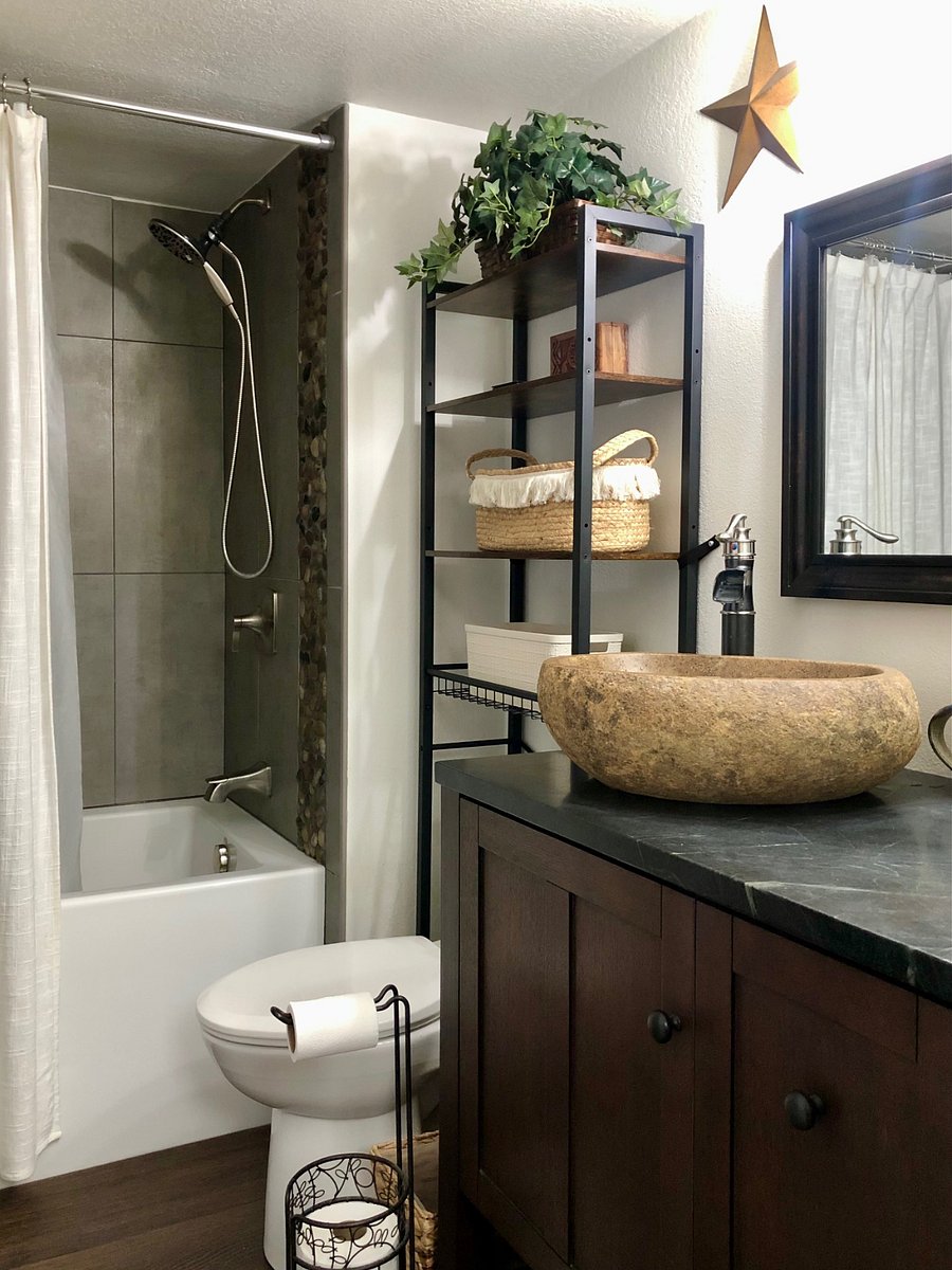 Bathroom has a deep soaker tub.