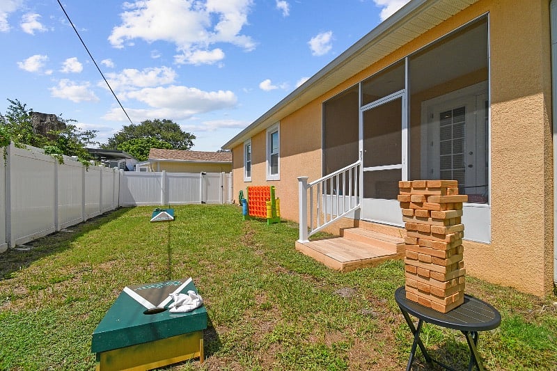 Enjoy the backyard space with a screened-in back patio and plenty of space in the backyard to enjoy our corn hole boards, giant jenga and giant connect four. 