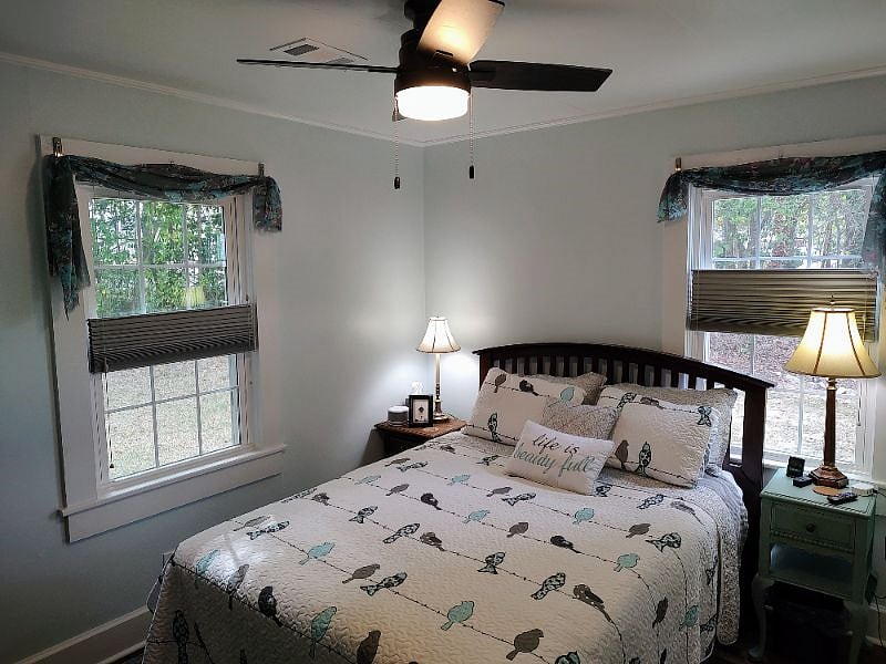 Second queen bedroom; cellular black out shades with corded top-down/bottom-up lift; convenient adapter for cell phones and other devices