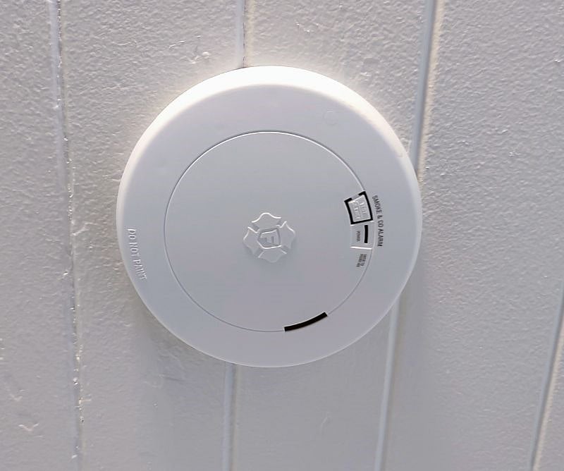 smoke and carbon monoxide detector in hall way.