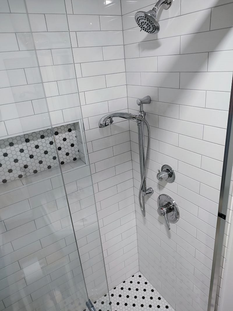 Luxurious shower with excellent water pressure and multiple shower setting options.