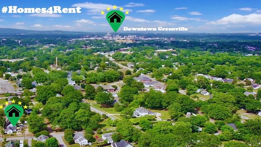 Minutes from Downtown Greenville, aerial shot of home and the city for reference.
