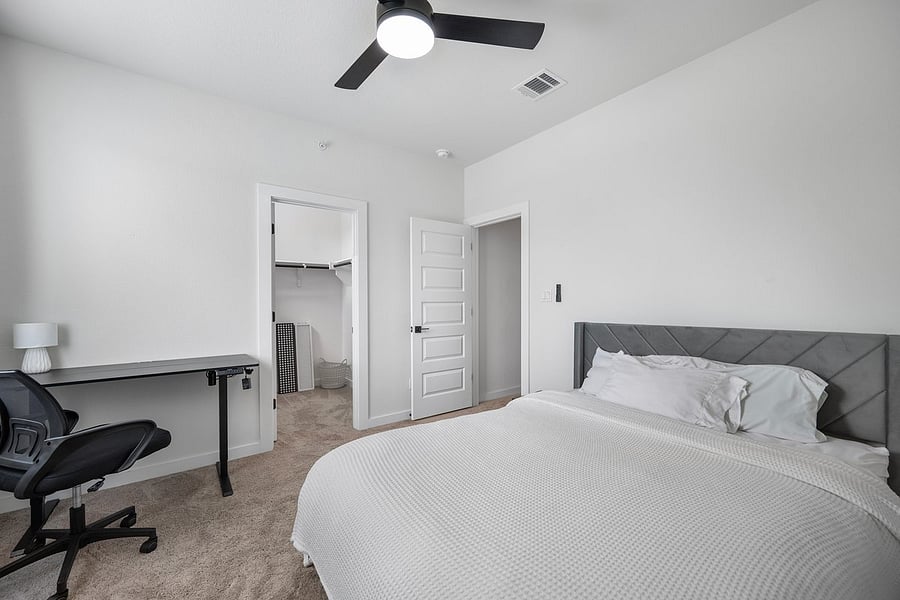 Queen bed with standing desk