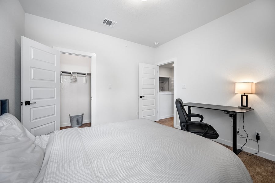 Queen bed with standing desk