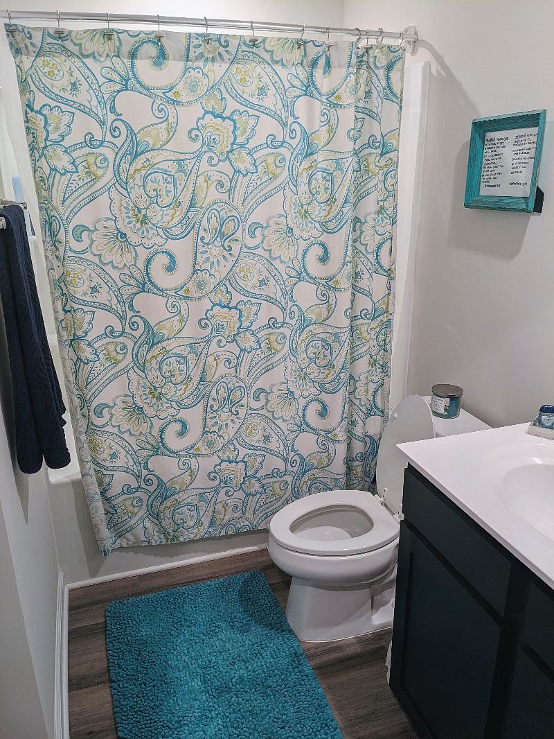 Shared full bath with storage