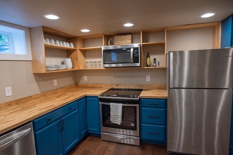 Stainless Whirlpool appliances throughout the kitchen.