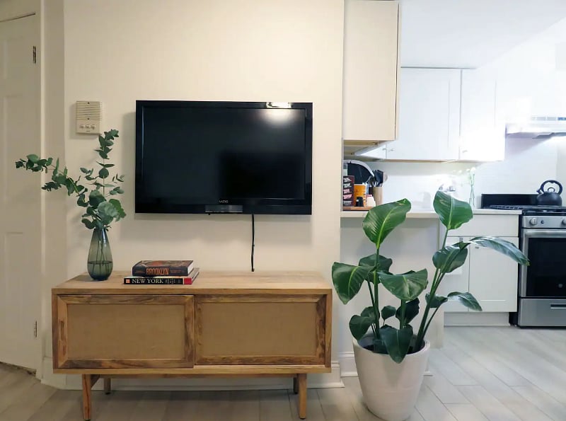 Living Room TV and Kitchen