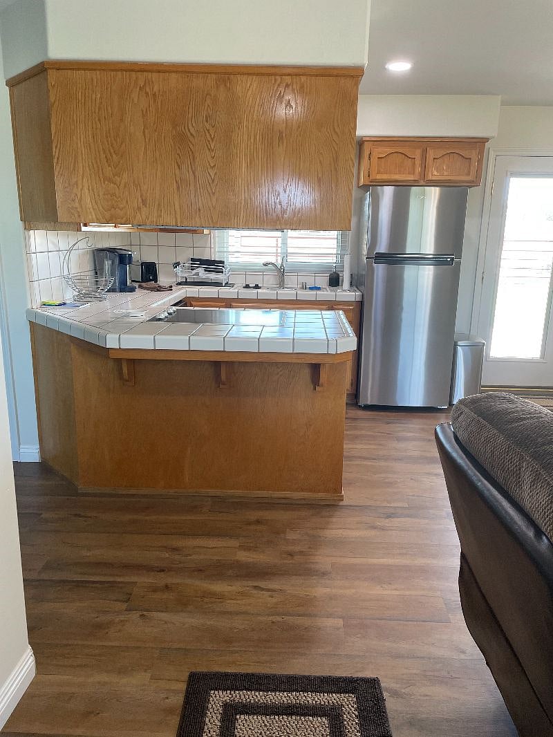 Kitchen with Full size Refrigerator