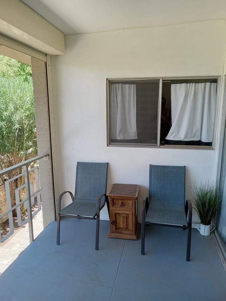 exterior deck and patio furniture (window connects to bedroom)