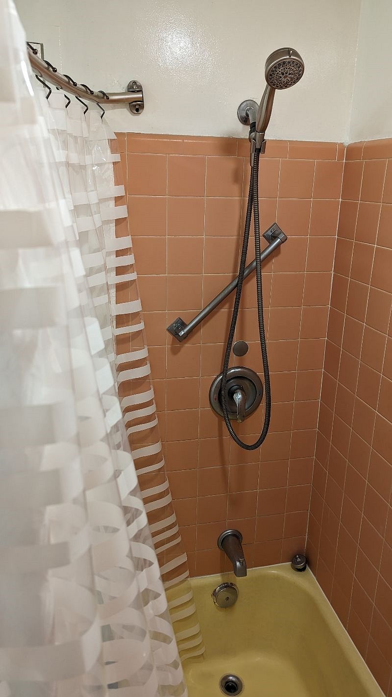 Shower with plenty of grab bars