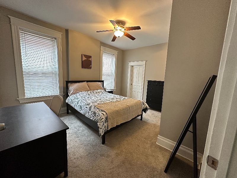 Primary bedroom with work from home desk
