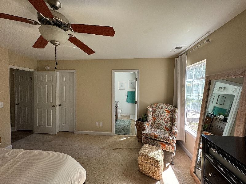 Master bedroom (the carpet has been shampooed and stretched since this photo was taken)