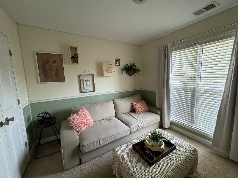 Bedroom 2 - currently a multi-purpose room - guest room (the 3.5 seat sofa pulls out to a bed), craft space with flip up table, and theatre room.