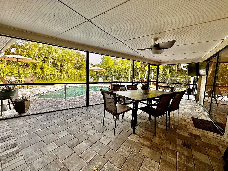 Screened Lanai with table for 6 and a flat screen tv