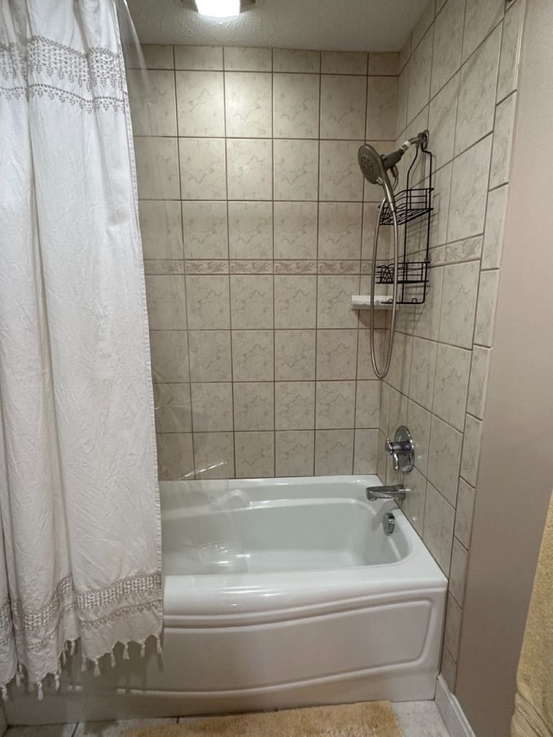 Large private 2nd bathroom with vanity area separated from shower/tub area (first view)