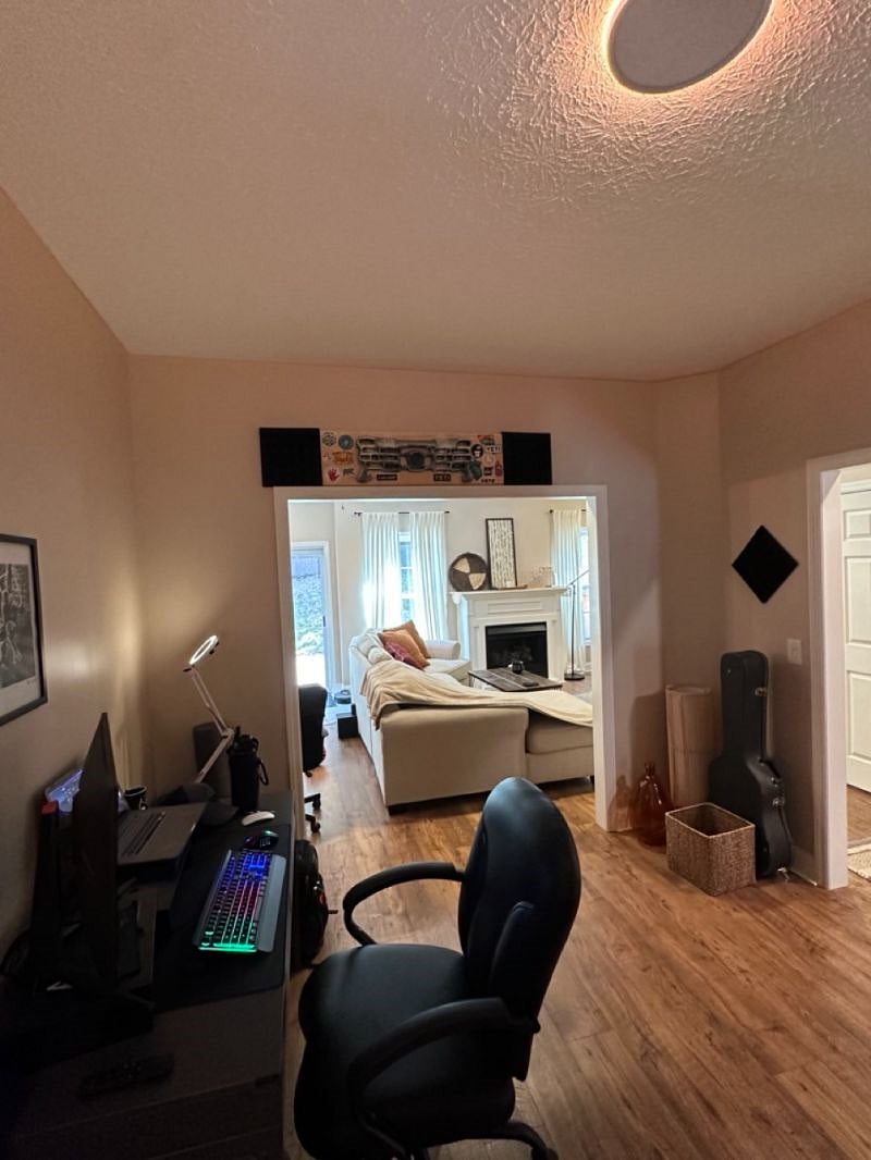 (2nd view of downstairs office between front door, living room and kitchen.