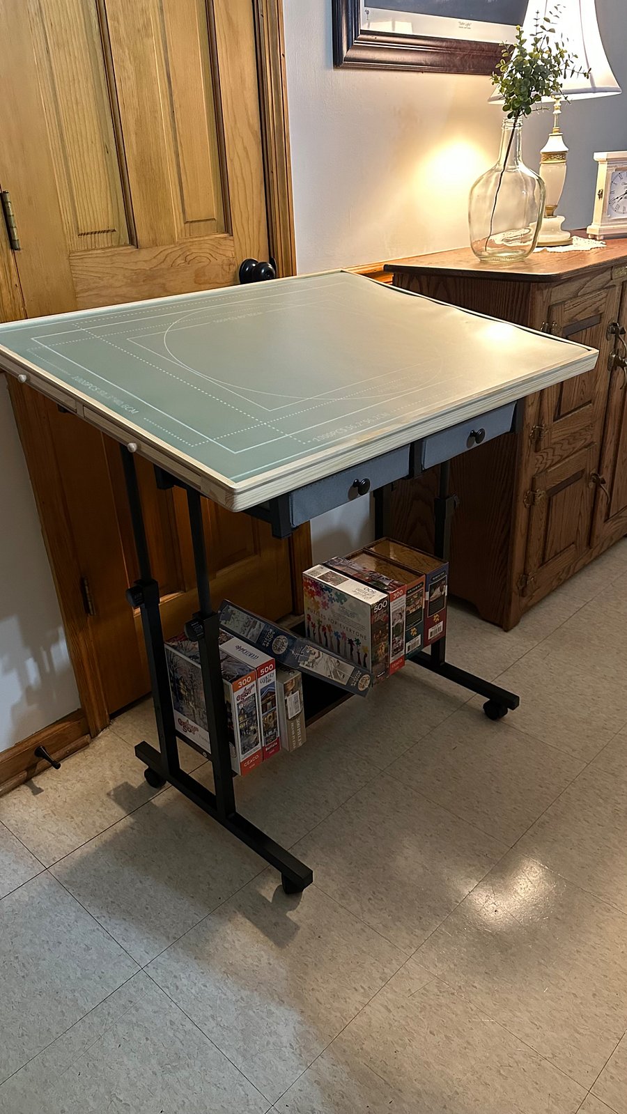Puzzle table with extra puzzles