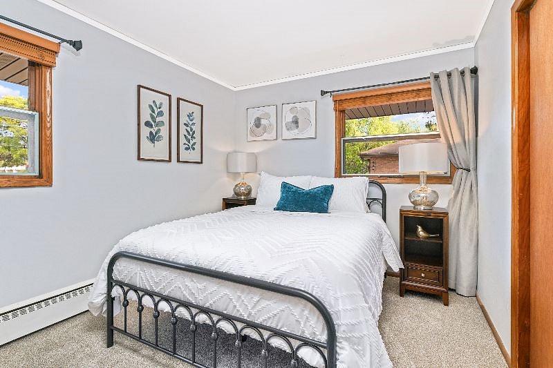 Bedroom 1 - queen bed with luxury linens, large closet, blinds plus room darkening curtains on windows