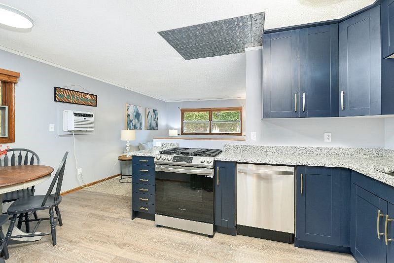 Open concept living room, dining area and kitchen