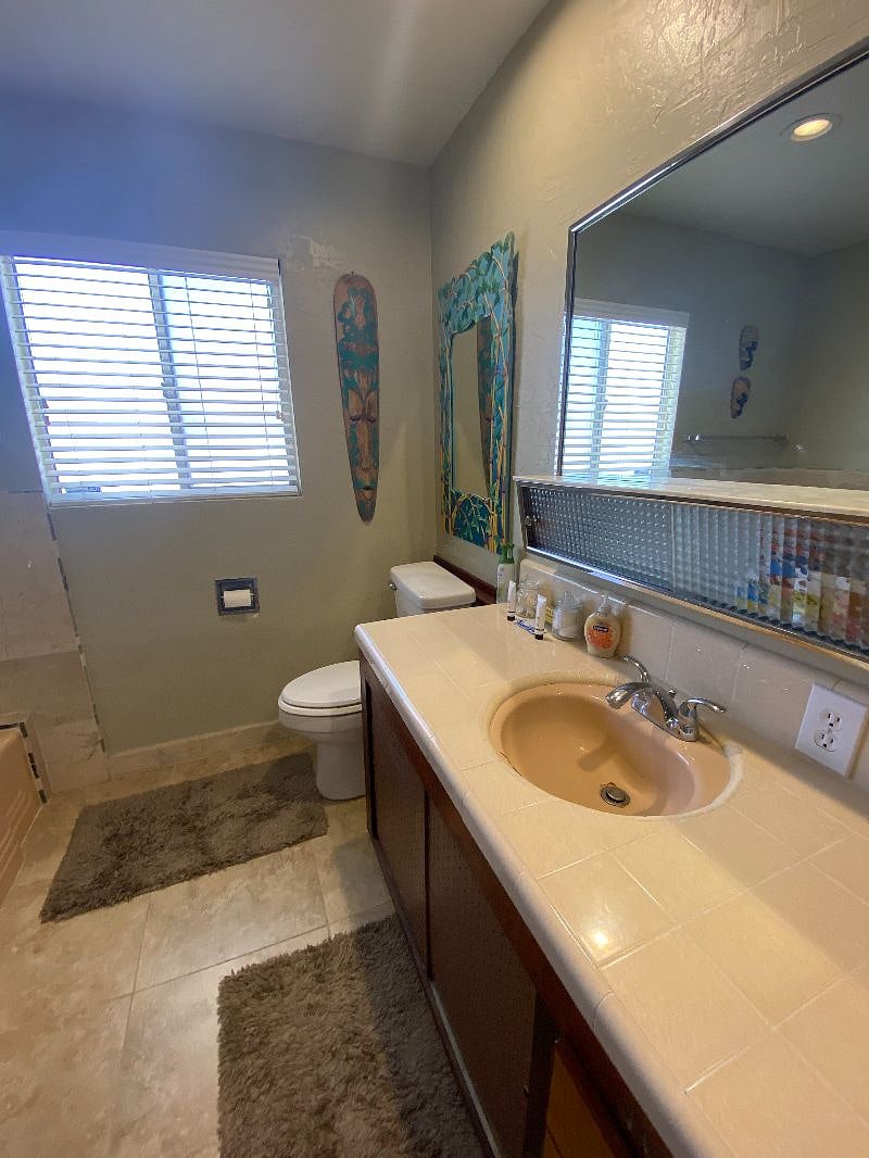 Bathroom with tub and separate shower.