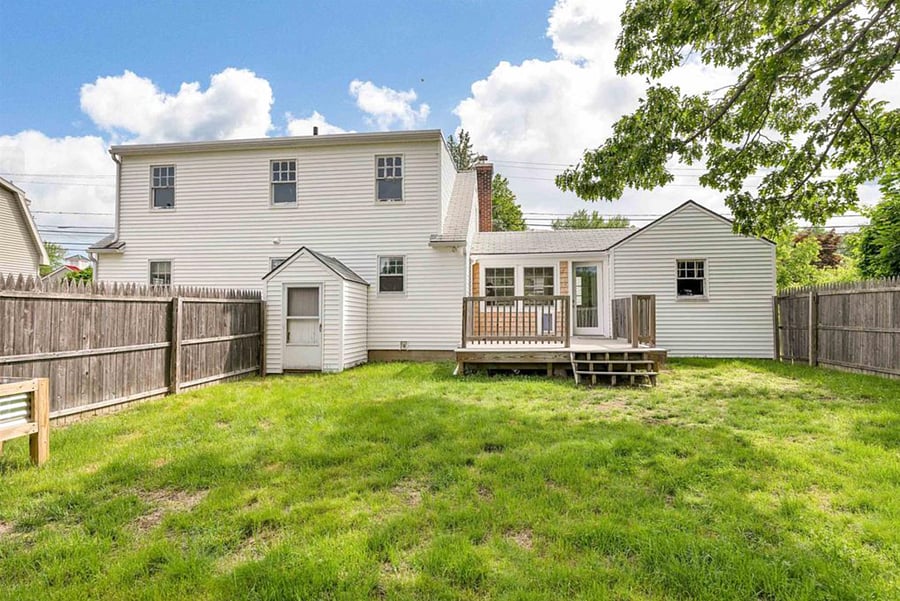 That Fenced in Yard with Deck and Lovely Tree!