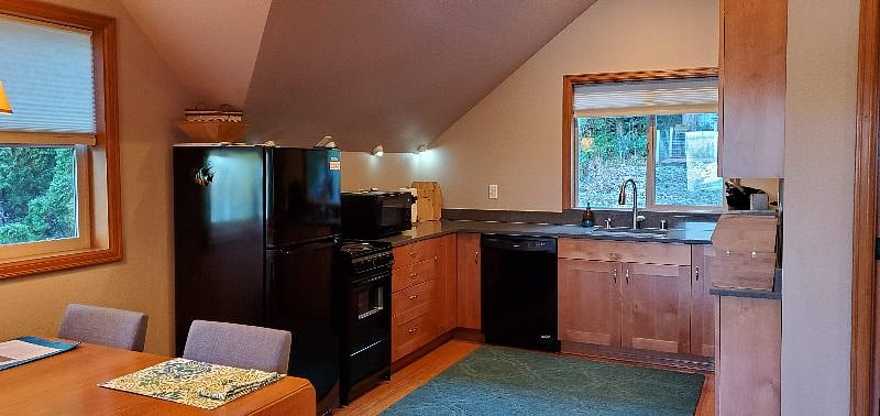 Well-stocked kitchen, dining room table