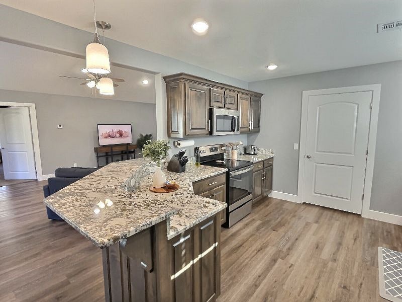 Spacious kitchen with granite countertops   fully equipped with all you need to prepare your favorite meals!

Also included: coffee maker, electric hot water kettle, coffee bean grinder, blender, toaster, wine glasses and all utensils you need!