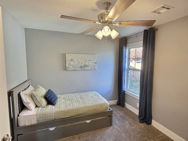 Bedroom 3 featuring a trundle twin bed with comfortable brand-new mattresses, cozy linens and nice size closet.
