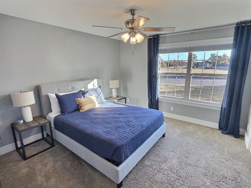Bedroom 2 invites you in will lots of natural light and a comfortable night's rest on this brand-new Queen bed. Included is a large closet and bedroom is located directly across from a full bathroom.