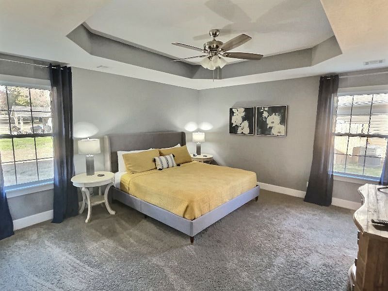 Rest well in the main bedroom with lots of natural light during the day, and cozy vibes at night as you sleep on the incredibly comfortable king bed. 

Also included in main bedroom is a brand-new Samsung 50" TV connected to Hulu and Disney+ for free!
