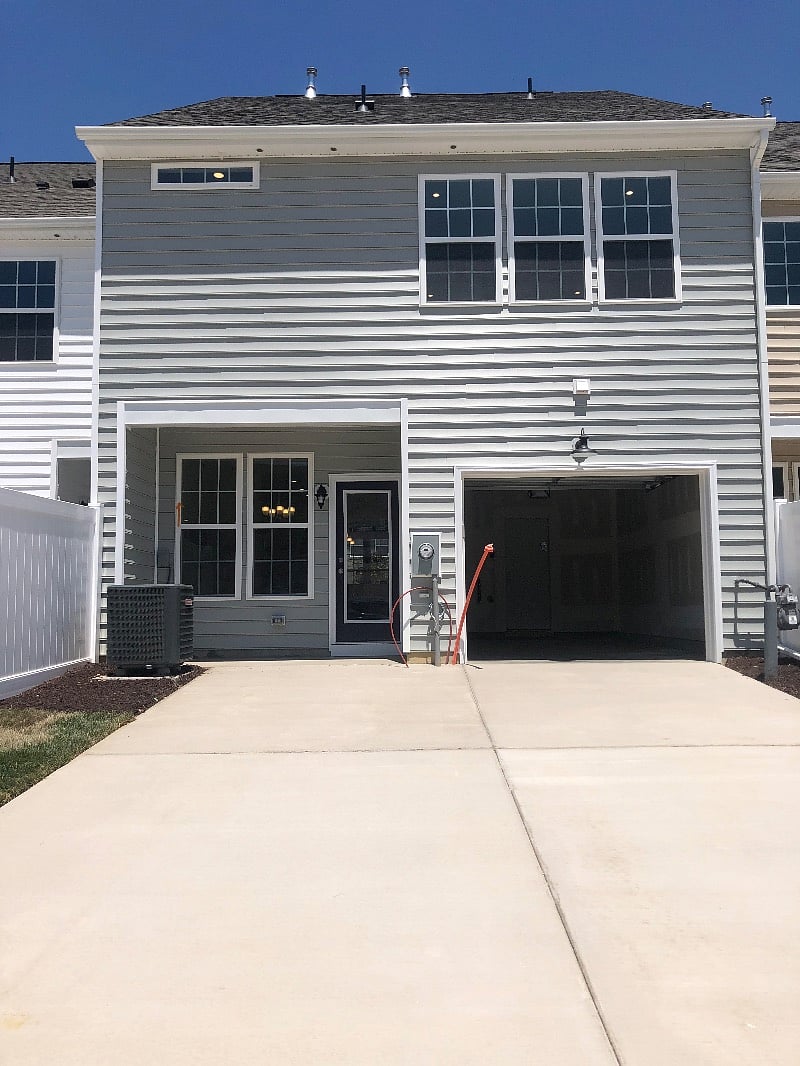 Renter can park in the driveway or front of home