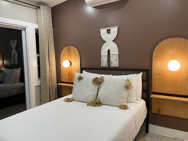 Full Size Bed in the Bedroom that Lead to the Patio