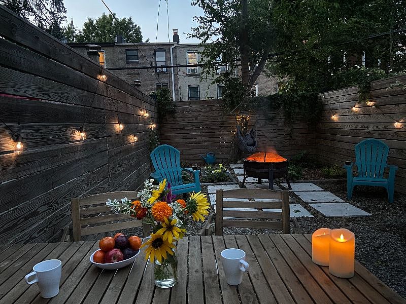 Evening Dinner in Backyard With Fire Pit