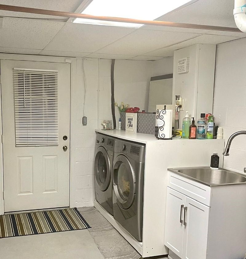 Washer, Dryer, Iron and Ironing Board Available For Use In The Laundry Room