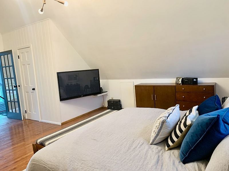 50in TV in primary bedroom