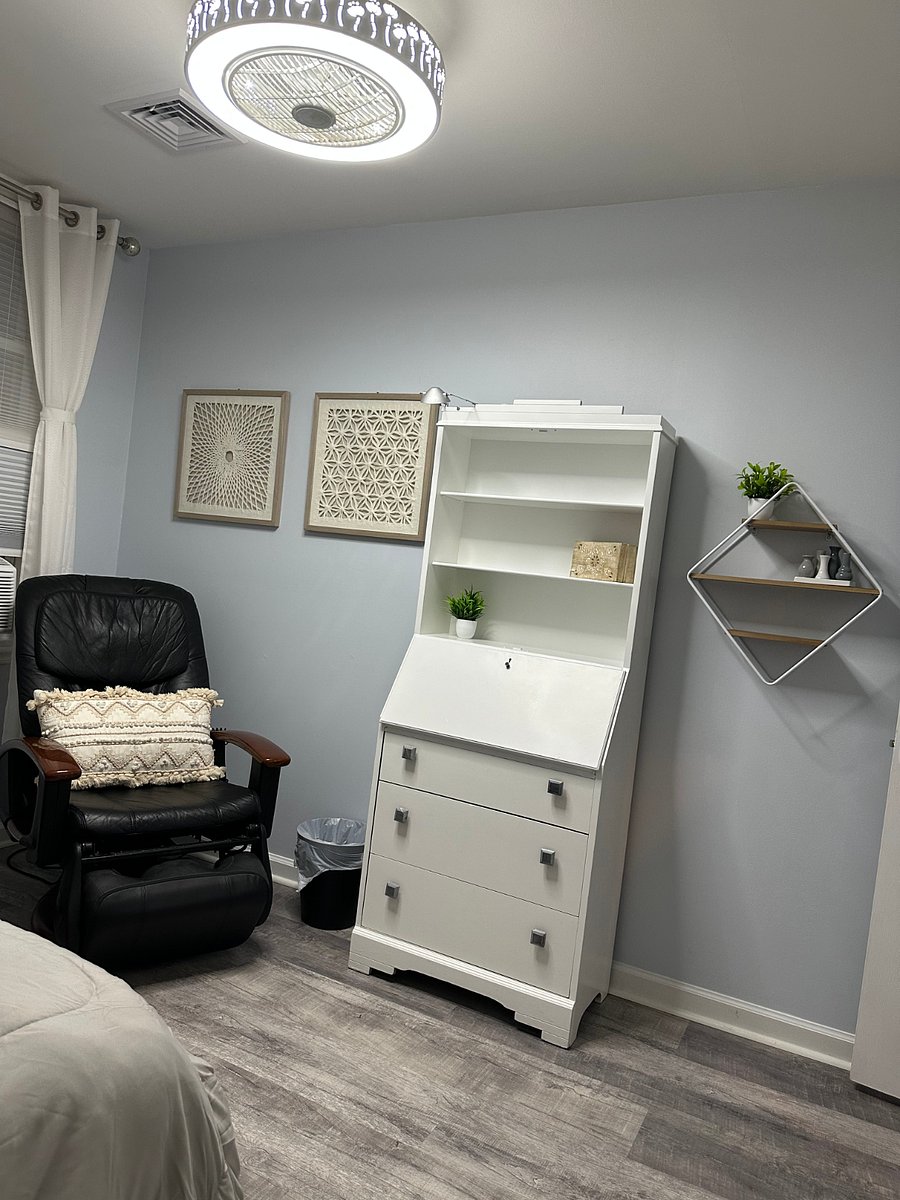 Massage chair for those long days, cabinet and desk-all in one. 