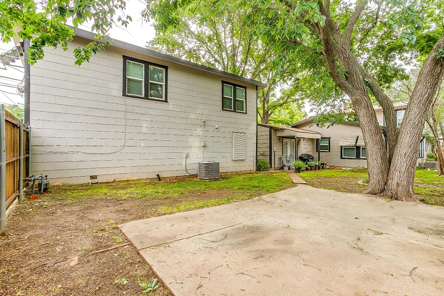 Back yard with room for chairs on the patio