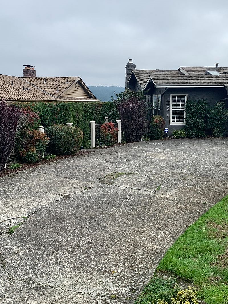 Home with path leading to private entrance.