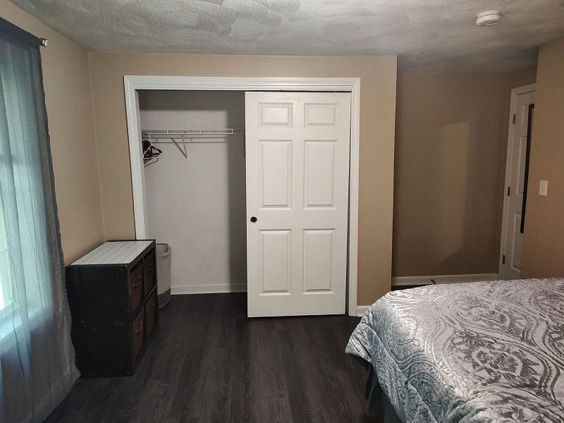 View of the large closet from the bed