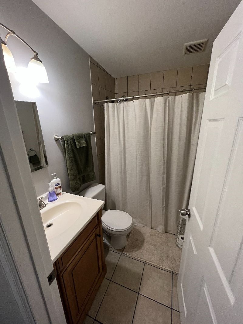 Primary bathroom with shower and tub.