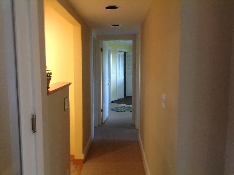 Hallway view looking towards bedrooms and bathroom