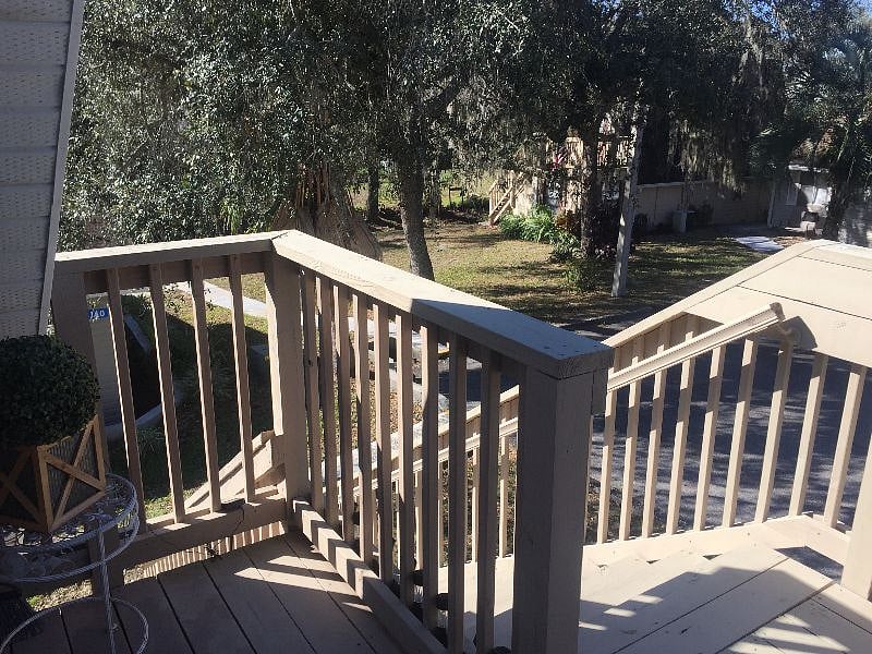 Private deck looks out towards park and lake