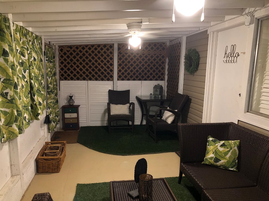 Screened in lanai leads to front door entrance.