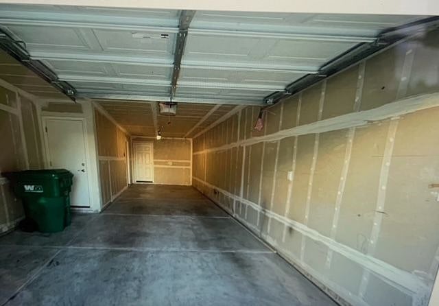 Two car tandem garage attached, with opener.